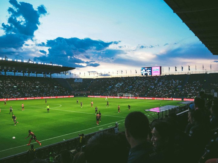 Football stadium with players