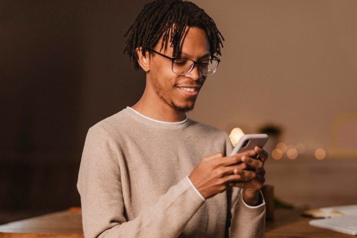 User playing on a smartphone